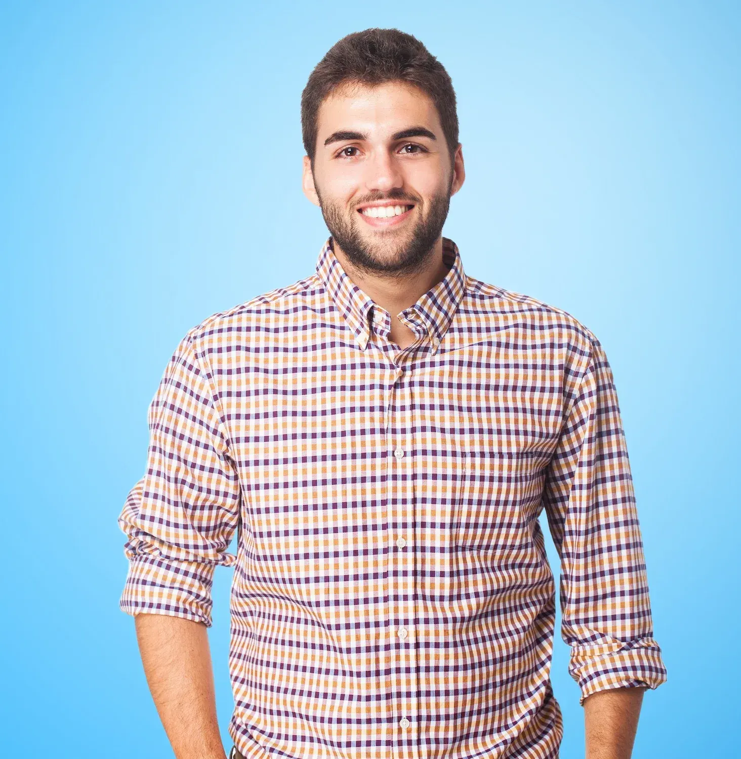 Confident adult patient smiling after consultation about 6 Month Smiles candidacy