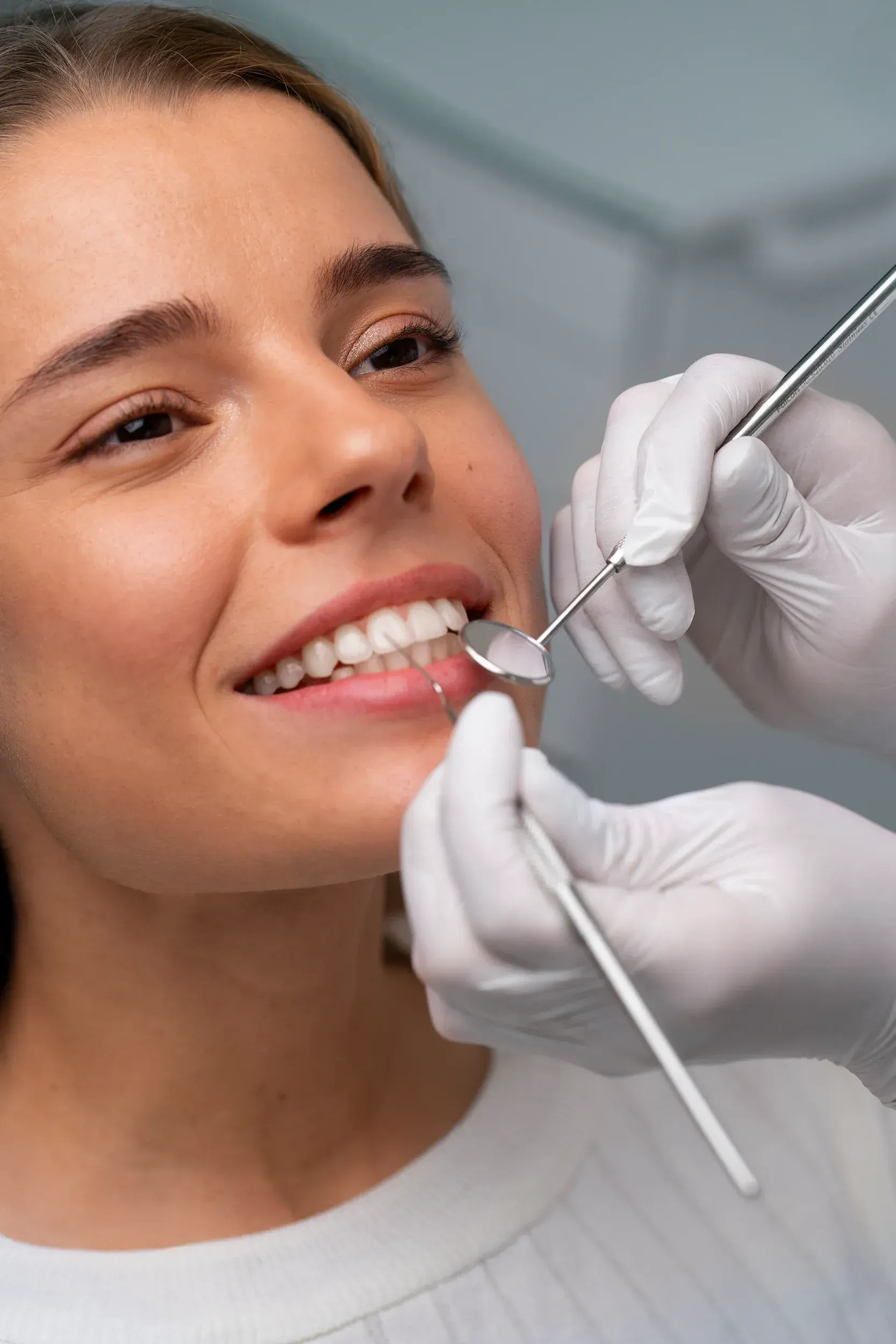 Patient consultation with Dr. Cook reviewing a dental bridge treatment plan