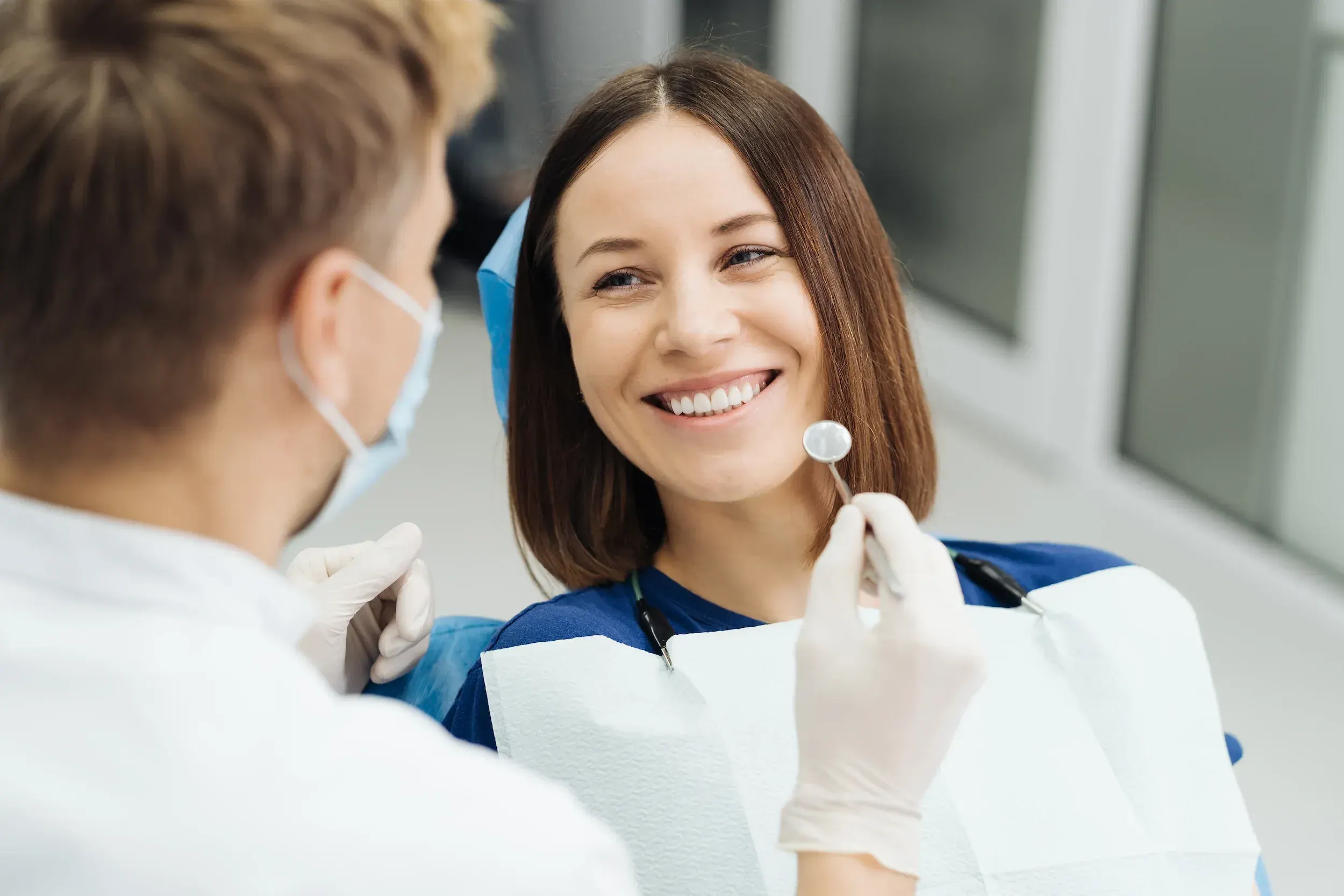 Patient receiving a dental implant consultation at Cook Family Dentistry in Santa Rosa Beach
