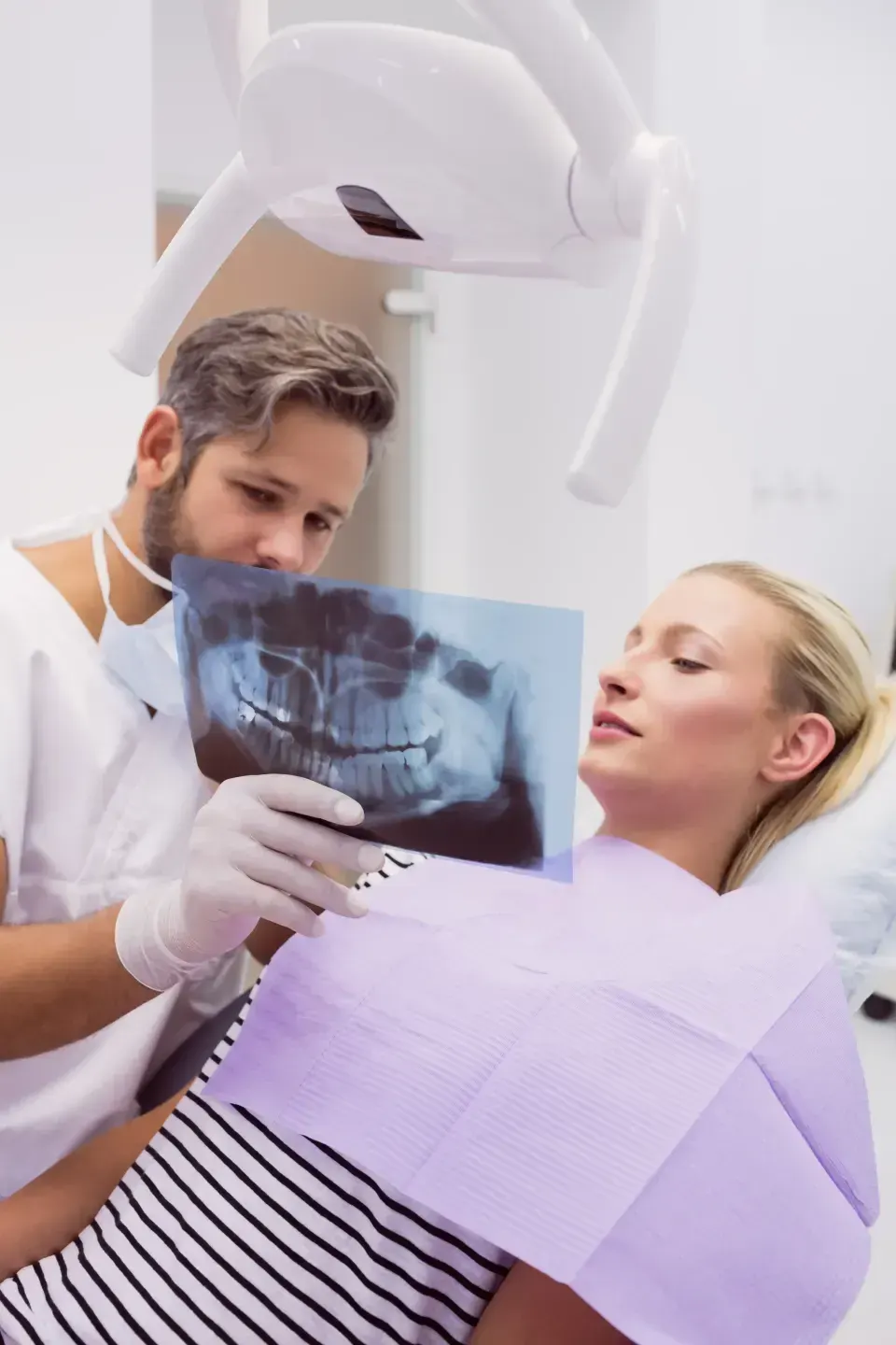 Side by side comparison of a digital bitewing X-ray and an intra-oral camera photo