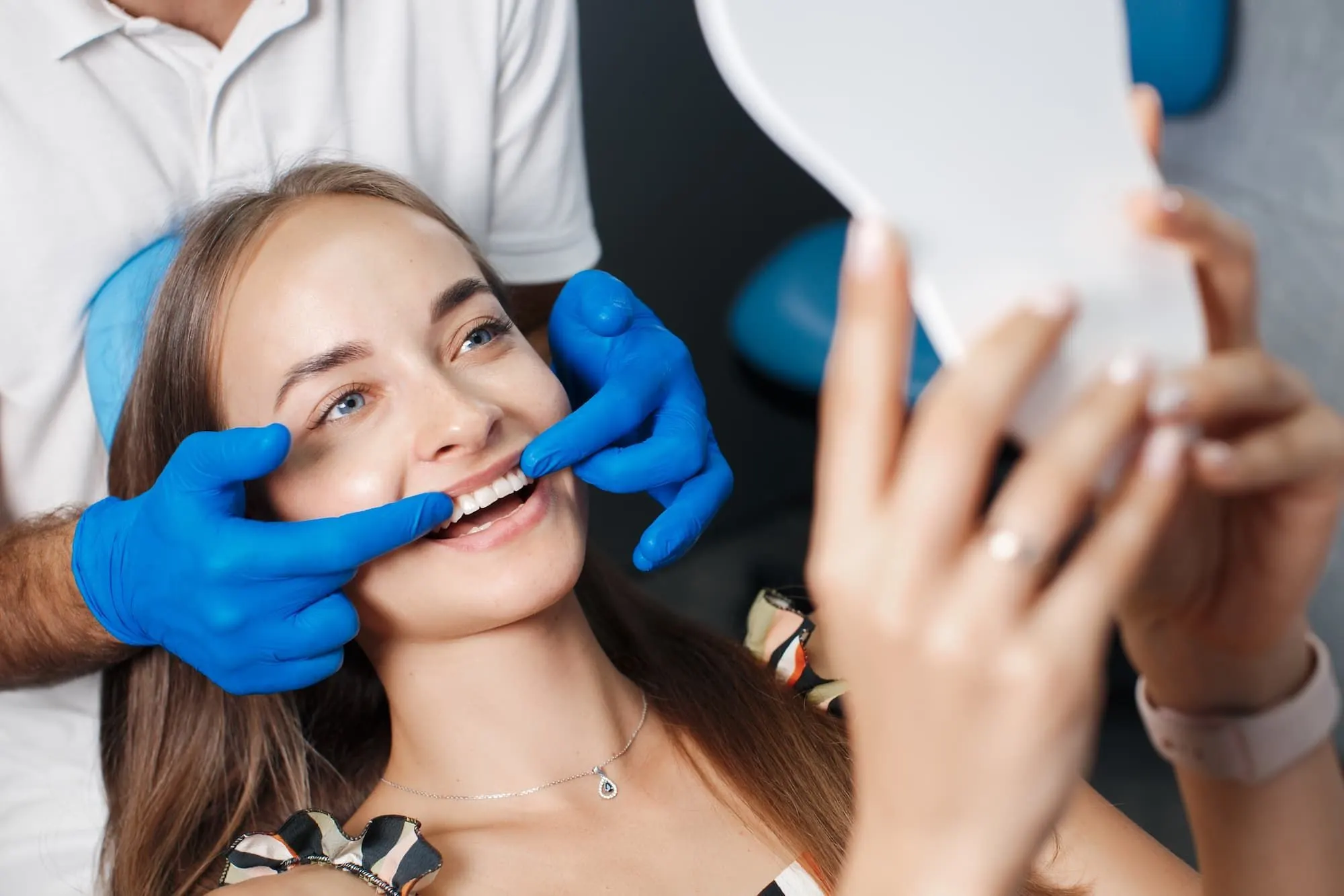 Patient smiling confidently after a complete smile makeover at Cook Family Dentistry in Santa Rosa Beach, FL