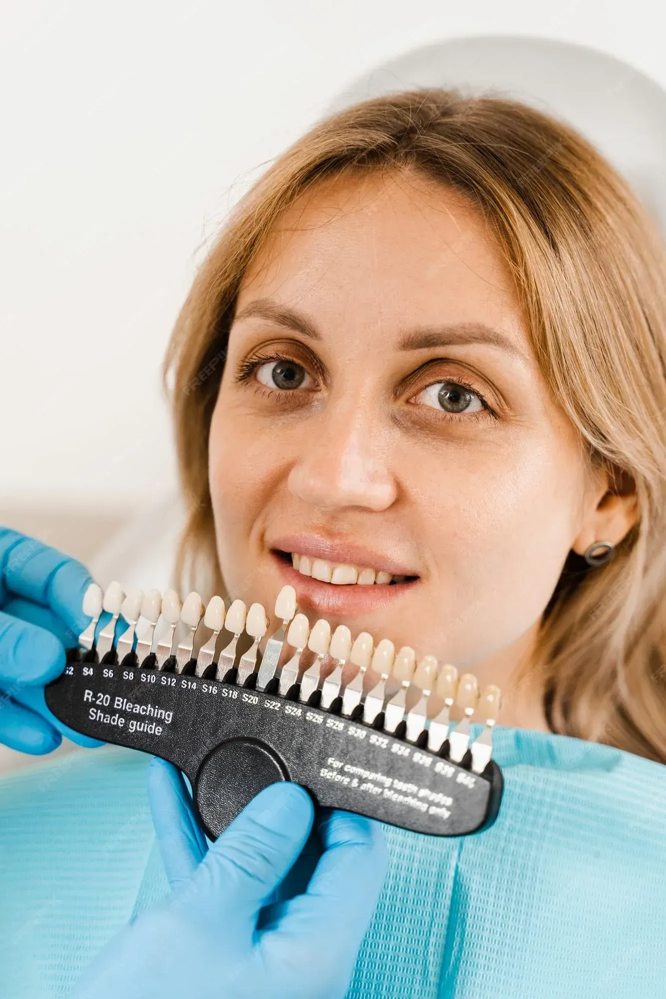 Confident patient considering veneers at a cosmetic consultation