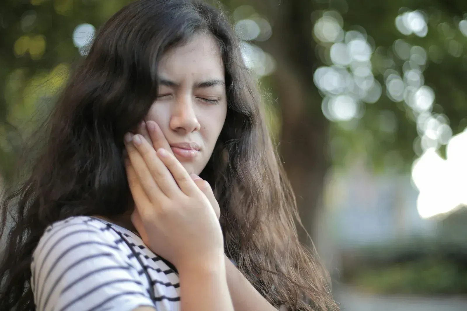 Calm young patient resting before wisdom teeth removal at Cook Family Dentistry in Santa Rosa Beach