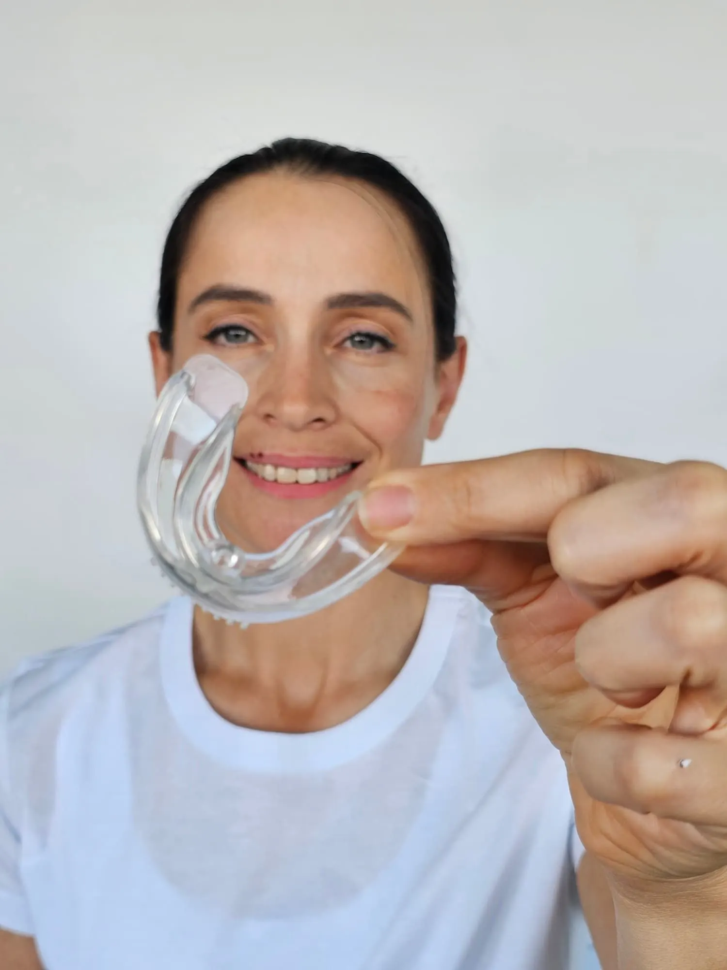Confident patient ready to be fitted for a custom mouth guard